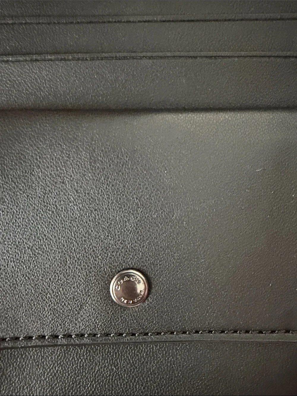 Coach Black Embossed Signature Wristlet men’s or women’s.